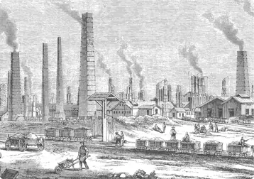 Engraving of a factory complex with smoking chimneys at the start of the Industrial Revolution.